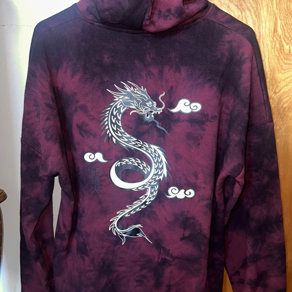 A maroon tie-dye hoodie with lettering and a dragon print on the back.worn once. - Picture 2 of 2